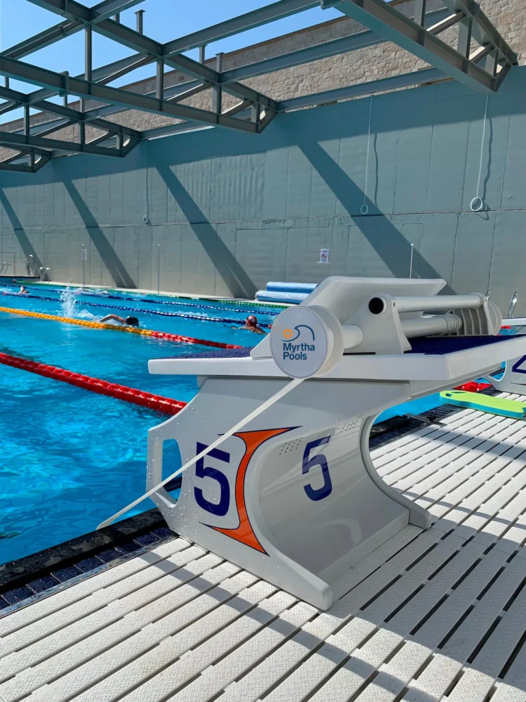 Backstroke start wedge mounted on a starting block