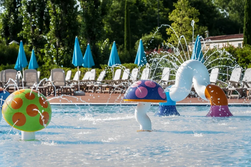 Water play features in a children’s pool